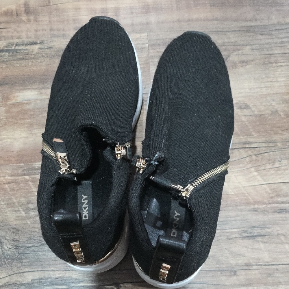 DKNY Black Slip-On Shoes with Metallic Details